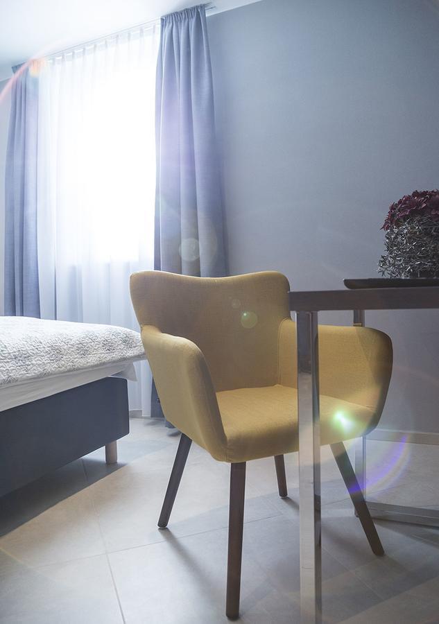 Hotel Tommasi เมอร์เฟลเดน-วาลล์ดอร์ฟ ภายนอก รูปภาพ